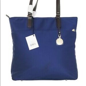 Lo & Sons T.T. Purse. Colors: navy/gold/lavender. Fits a laptop